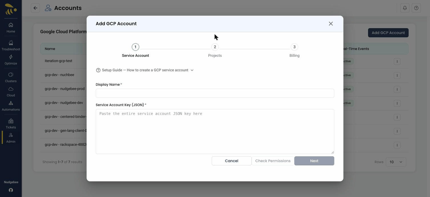 Step 1 of the Add GCP Account wizard — entering a Display Name and pasting the Service Account Key (JSON), with the Service Account, Projects, and Billing steps shown at the top